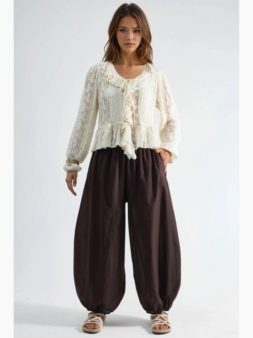 Pantalon crêpe à jambes larges busem - Kiabi Pantalon crêpe à jambes larges busem - Kiabi