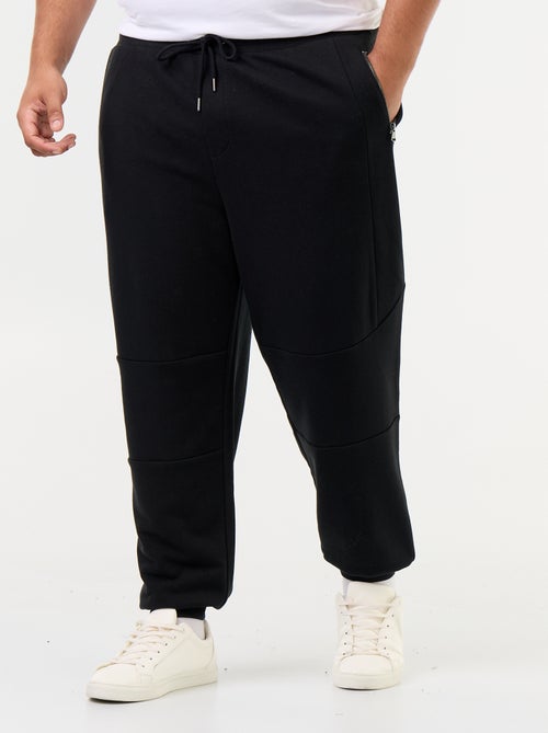 Pantalon de jogging avec bas resserré et poches zippées - Kiabi