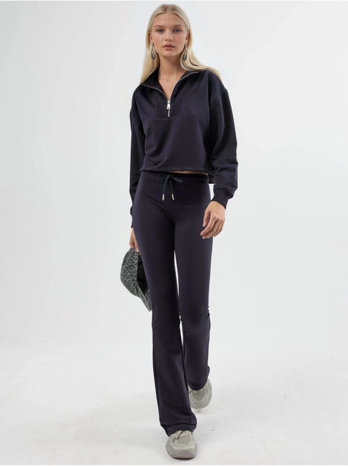 Pantalon de jogging évasé taille mi-haute avec cordon busem - Kiabi Pantalon de jogging évasé taille mi-haute avec cordon busem - Kiabi