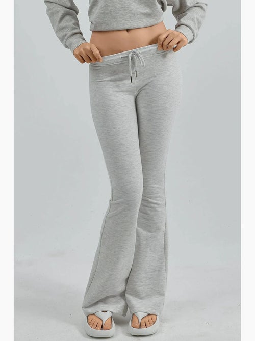Pantalon de jogging évasé taille mi-haute avec cordon busem - Kiabi Pantalon de jogging évasé taille mi-haute avec cordon busem - Kiabi