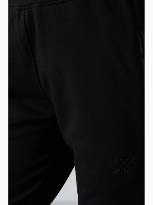 Pantalon de jogging femme à jambe droite tommy - Kiabi Pantalon de jogging femme à jambe droite tommy - Kiabi