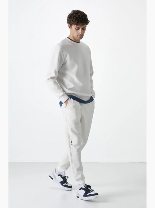 Pantalon de jogging homme à jambe fuselée tommy - Kiabi Pantalon de jogging homme à jambe fuselée tommy - Kiabi