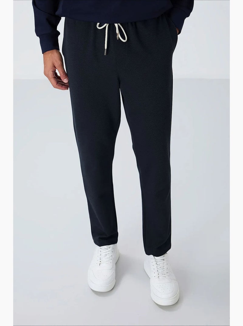 Pantalon de jogging homme à taille élastique tommy Indigo - Kiabi