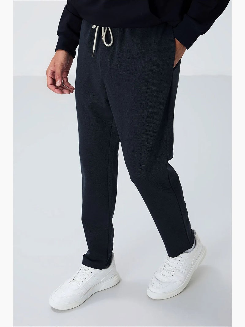 Pantalon de jogging homme à taille élastique tommy Indigo - Kiabi