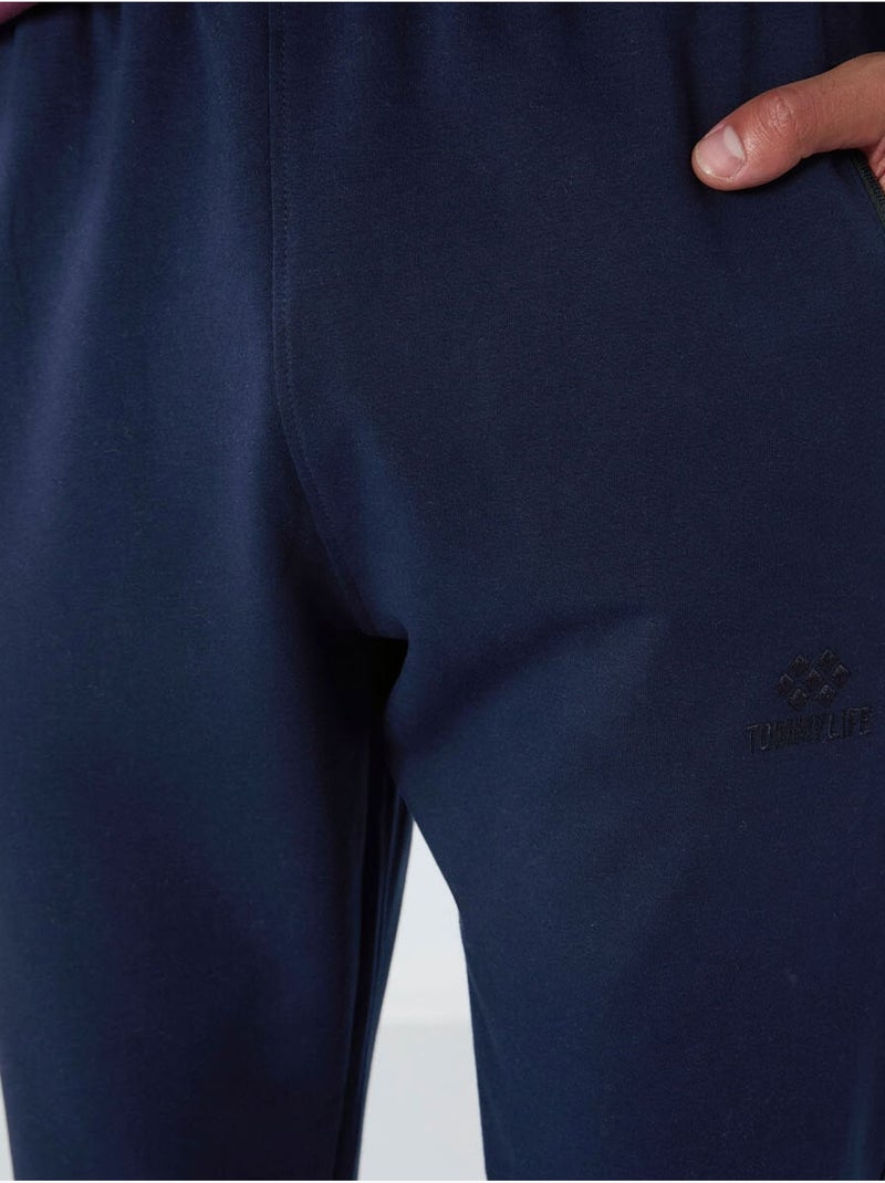 Pantalon de jogging homme avec poche zippée tommy Bleu marine - Kiabi