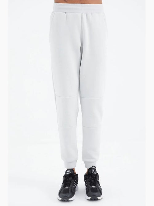 Pantalon de jogging homme coupe décontractée en molleton tommy - Kiabi Pantalon de jogging homme coupe décontractée en molleton tommy - Kiabi