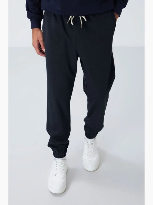 Pantalon de jogging homme coupe regular en molleton tommy - Kiabi Pantalon de jogging homme coupe regular en molleton tommy - Kiabi