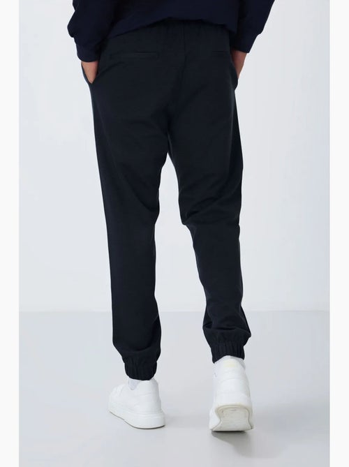Pantalon de jogging homme coupe regular en molleton tommy - Kiabi Pantalon de jogging homme coupe regular en molleton tommy - Kiabi