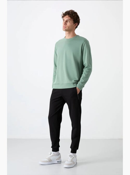 Pantalon de jogging homme en mélange coton tommy - Kiabi Pantalon de jogging homme en mélange coton tommy - Kiabi