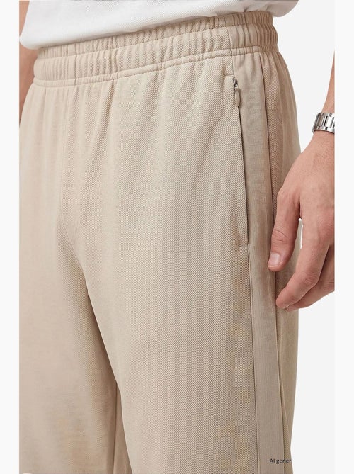 Pantalon de jogging homme en mélange de viscose tommy - Kiabi Pantalon de jogging homme en mélange de viscose tommy - Kiabi
