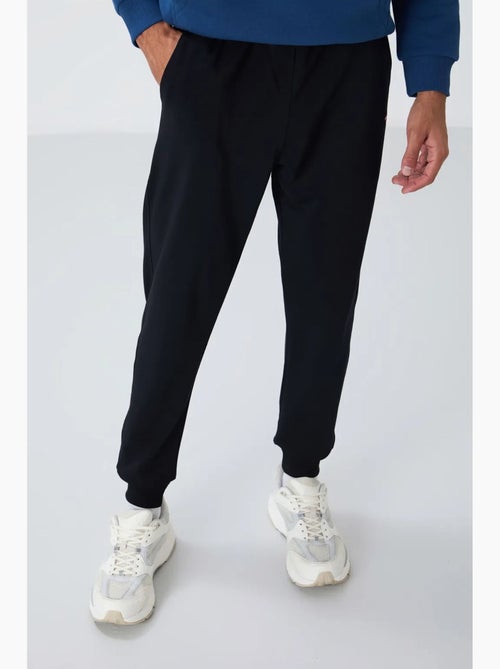 Pantalon de jogging homme en molton uni tommy - Kiabi