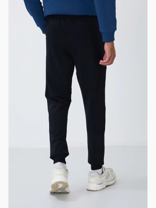 Pantalon de jogging homme en molton uni tommy - Kiabi