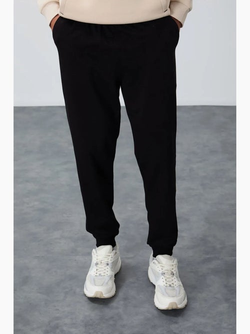 Pantalon de jogging homme en molton uni tommy - Kiabi