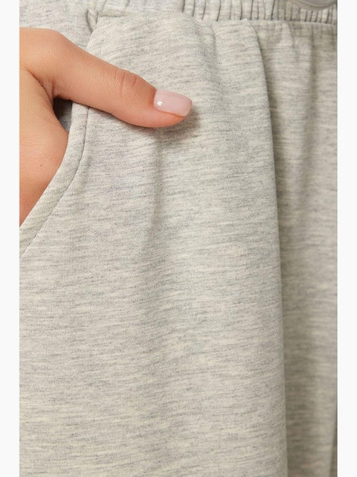 Pantalon de jogging jambe large à taille à cordon istanbul - Kiabi Pantalon de jogging jambe large à taille à cordon istanbul - Kiabi
