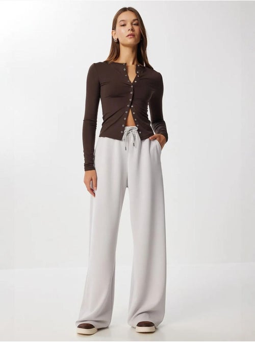 Pantalon de jogging jambe large à taille à cordon istanbul - Kiabi Pantalon de jogging jambe large à taille à cordon istanbul - Kiabi