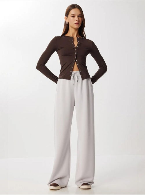 Pantalon de jogging jambe large à taille à cordon istanbul - Kiabi Pantalon de jogging jambe large à taille à cordon istanbul - Kiabi