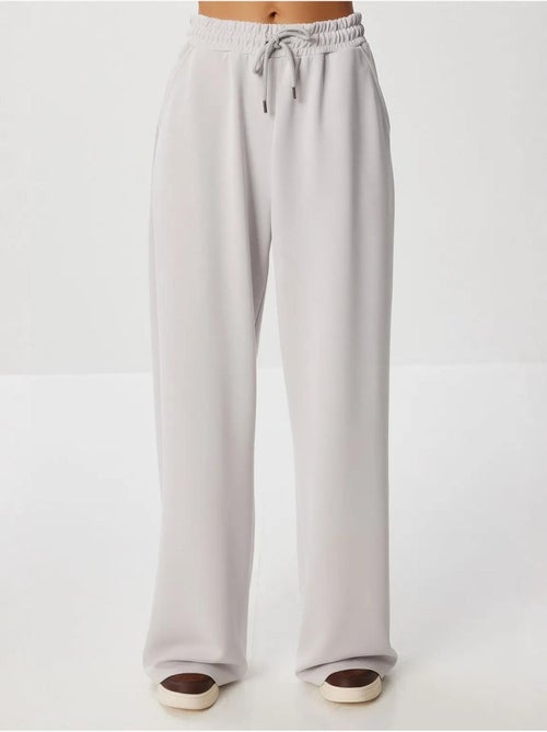 Pantalon de jogging jambe large à taille à cordon istanbul - Kiabi Pantalon de jogging jambe large à taille à cordon istanbul - Kiabi