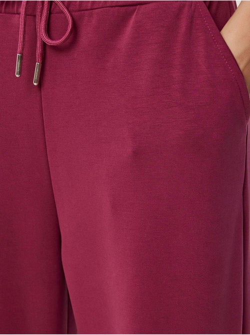 Pantalon de jogging jambe large à taille à cordon istanbul - Kiabi Pantalon de jogging jambe large à taille à cordon istanbul - Kiabi