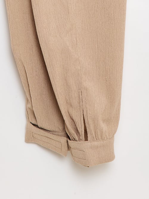Pantalon de jogging pour femme en maille légère à taille élastiquée - Kiabi Pantalon de jogging pour femme en maille légère à taille élastiquée - Kiabi