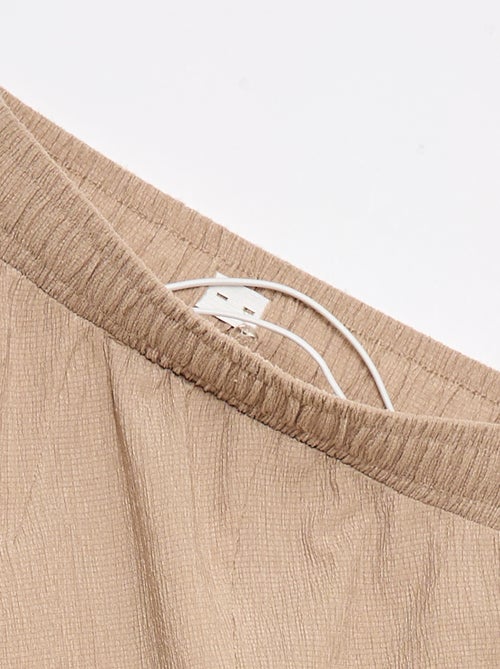 Pantalon de jogging pour femme en maille légère à taille élastiquée - Kiabi Pantalon de jogging pour femme en maille légère à taille élastiquée - Kiabi