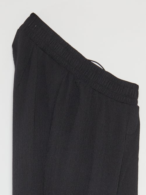 Pantalon de jogging pour femme en maille légère à taille élastiquée - Kiabi Pantalon de jogging pour femme en maille légère à taille élastiquée - Kiabi
