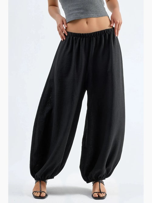 Pantalon de jogging taille basse coupe ample hiccup - Kiabi Pantalon de jogging taille basse coupe ample hiccup - Kiabi