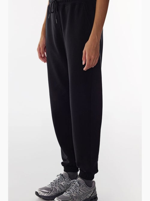 Pantalon de jogging taille haute à bas resserrés penti - Kiabi Pantalon de jogging taille haute à bas resserrés penti - Kiabi