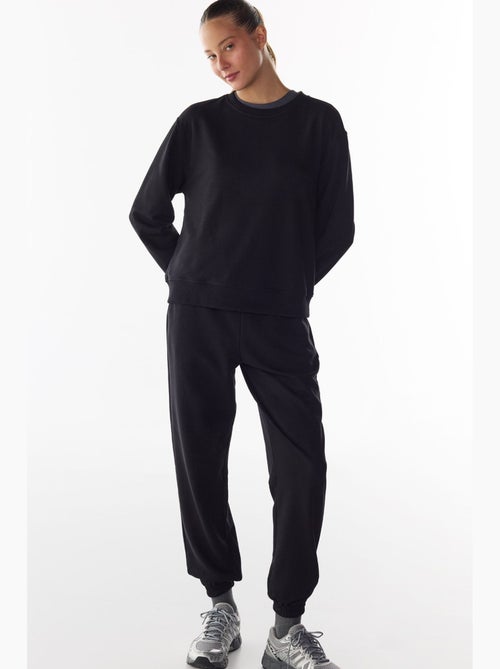 Pantalon de jogging taille haute à bas resserrés penti - Kiabi Pantalon de jogging taille haute à bas resserrés penti - Kiabi