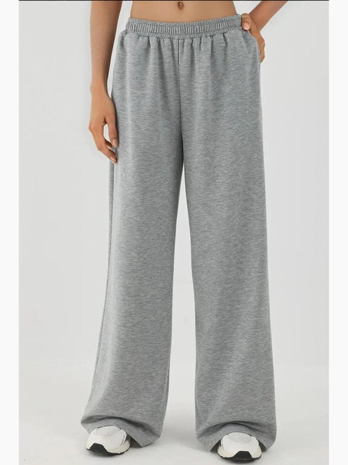 Pantalon de survêtement à jambe large et taille élastique hiccup - Kiabi Pantalon de survêtement à jambe large et taille élastique hiccup - Kiabi