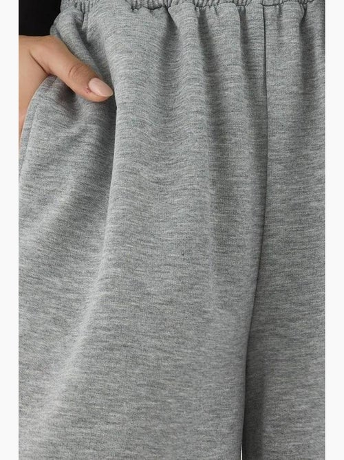 Pantalon de survêtement à jambe large et taille élastique hiccup - Kiabi Pantalon de survêtement à jambe large et taille élastique hiccup - Kiabi