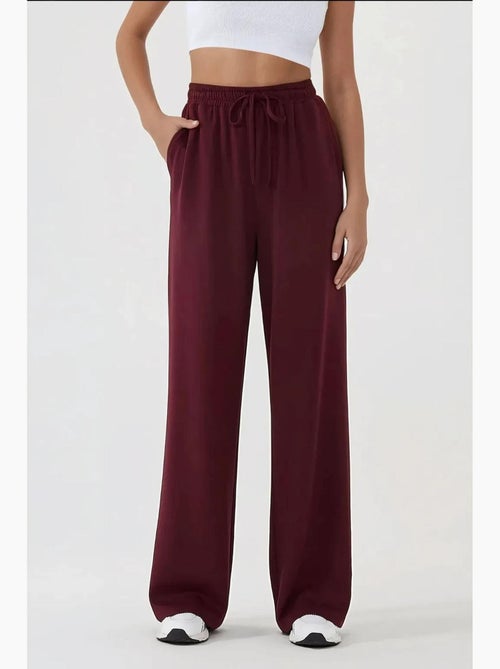 Pantalon de survêtement à jambe large et taille élastique hiccup - Kiabi Pantalon de survêtement à jambe large et taille élastique hiccup - Kiabi