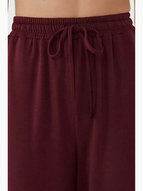 Pantalon de survêtement à jambe large et taille élastique hiccup - Kiabi Pantalon de survêtement à jambe large et taille élastique hiccup - Kiabi