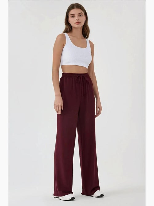 Pantalon de survêtement à jambe large et taille élastique hiccup - Kiabi Pantalon de survêtement à jambe large et taille élastique hiccup - Kiabi