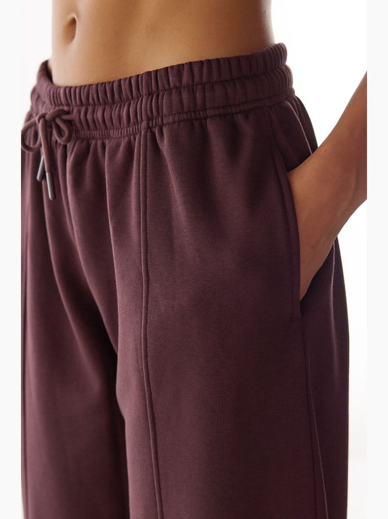 Pantalon de survêtement coupe ballon avec détails de couture, molletonné penti Rouge bordeaux - Kiabi