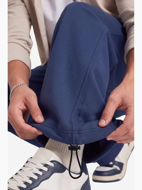 Pantalon de survêtement homme en mélange de coton tommy - Kiabi Pantalon de survêtement homme en mélange de coton tommy - Kiabi