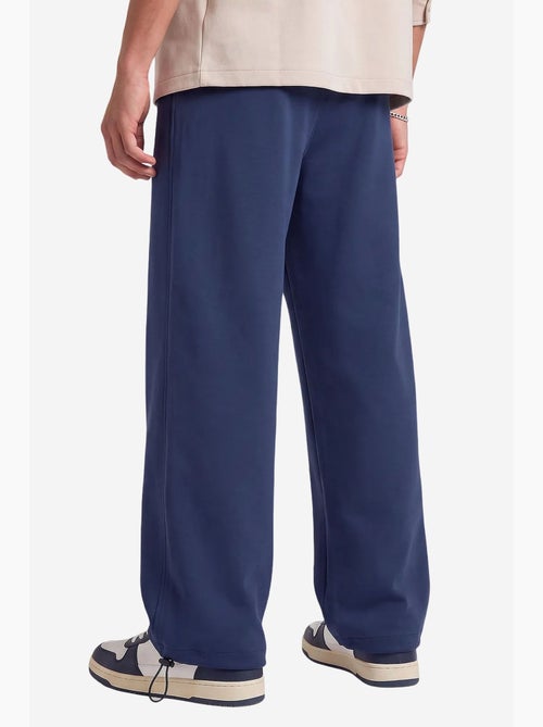 Pantalon de survêtement homme en mélange de coton tommy - Kiabi Pantalon de survêtement homme en mélange de coton tommy - Kiabi