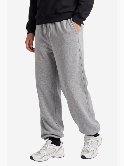 Pantalon de survêtement homme en mélange de coton tommy - Kiabi Pantalon de survêtement homme en mélange de coton tommy - Kiabi