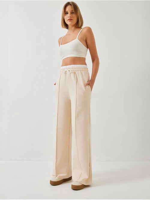 Pantalon élastique à taille nouée lucci - Kiabi Pantalon élastique à taille nouée lucci - Kiabi