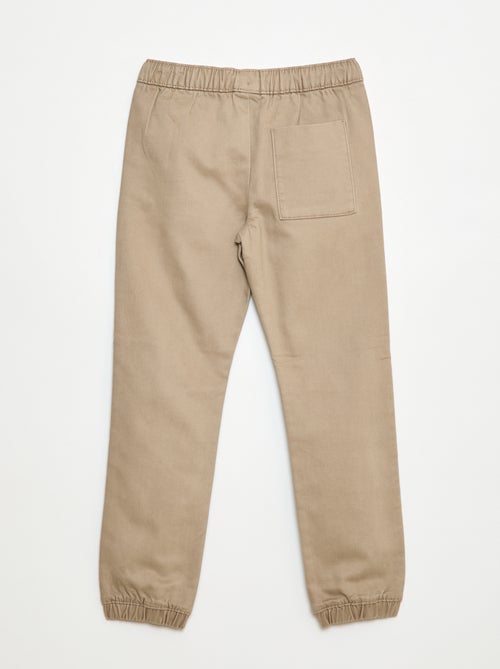 Pantalon élastiqué en coton - Kiabi Pantalon élastiqué en coton - Kiabi