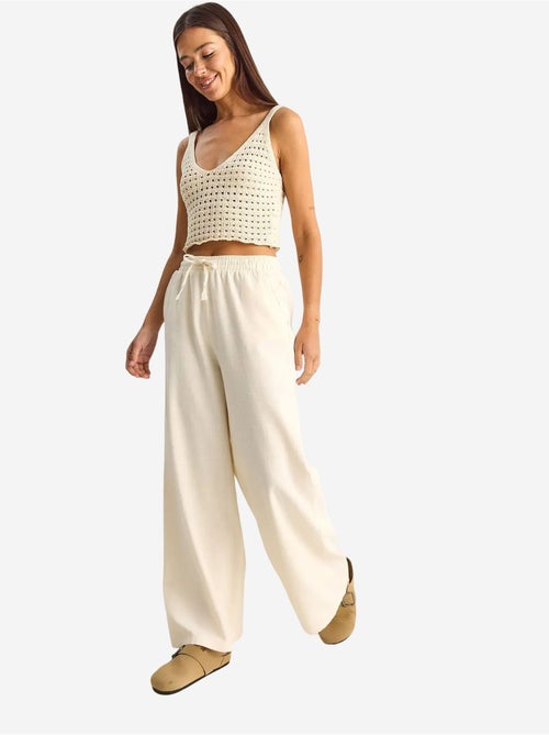 Pantalon en coton à jambes larges avec cordon à la taille lucci - Kiabi Pantalon en coton à jambes larges avec cordon à la taille lucci - Kiabi