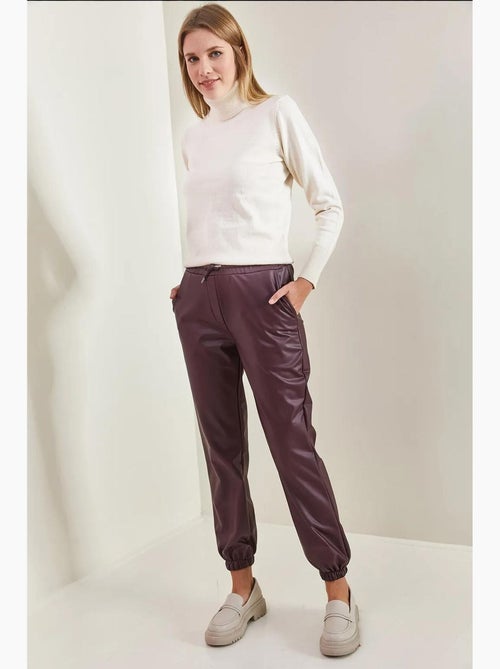 Pantalon en cuir à taille et poignets élastiques bianco lucci - Kiabi Pantalon en cuir à taille et poignets élastiques bianco lucci - Kiabi
