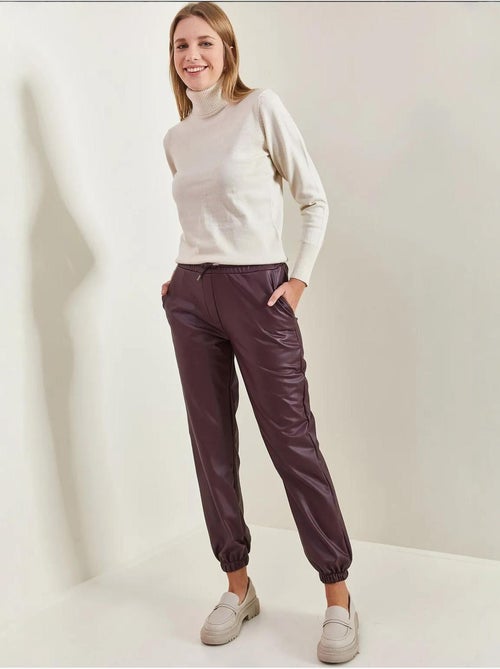 Pantalon en cuir à taille et poignets élastiques bianco lucci - Kiabi Pantalon en cuir à taille et poignets élastiques bianco lucci - Kiabi