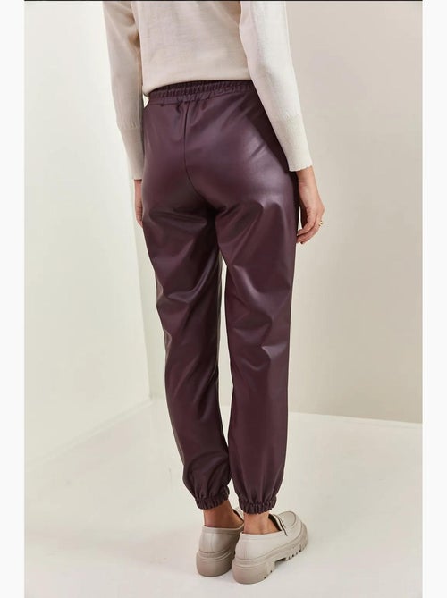 Pantalon en cuir à taille et poignets élastiques bianco lucci - Kiabi Pantalon en cuir à taille et poignets élastiques bianco lucci - Kiabi