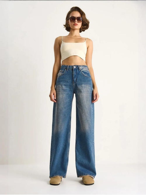 Pantalon en jean taille haute et jambe large lucci - Kiabi Pantalon en jean taille haute et jambe large lucci - Kiabi