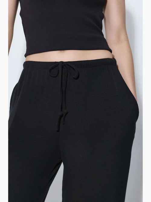 Pantalon en jersey à jambe large busem - Kiabi Pantalon en jersey à jambe large busem - Kiabi