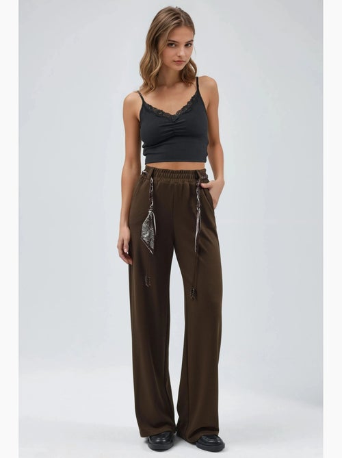 Pantalon en maille taille haute à jambes droites hiccup - Kiabi Pantalon en maille taille haute à jambes droites hiccup - Kiabi