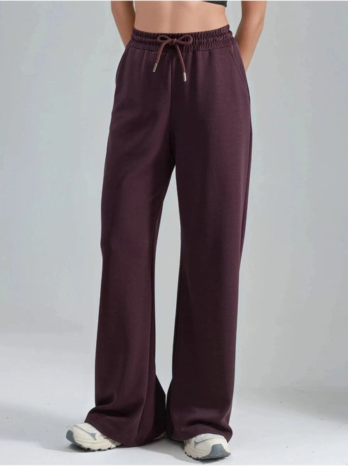 Pantalon en maille taille haute et jambes larges busem - Kiabi Pantalon en maille taille haute et jambes larges busem - Kiabi