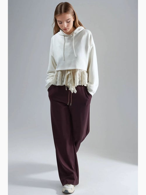 Pantalon en maille taille haute et jambes larges busem - Kiabi Pantalon en maille taille haute et jambes larges busem - Kiabi