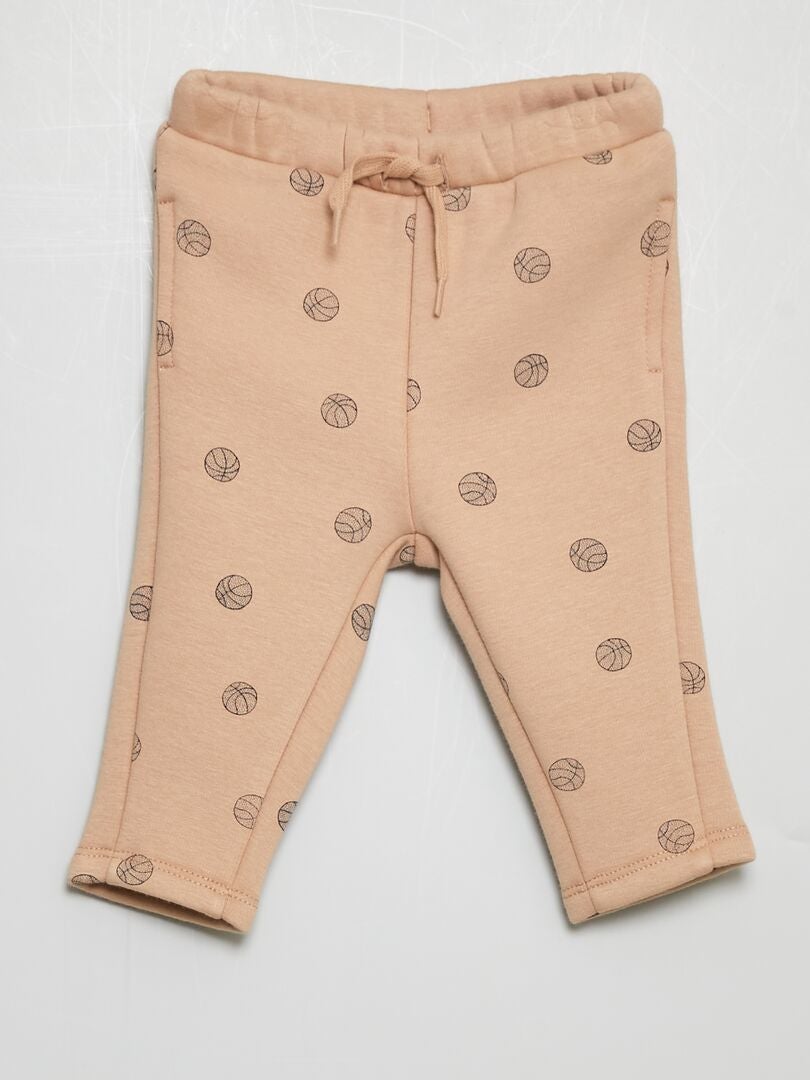 Pantalon en molleton avec imprimé Beige - Kiabi