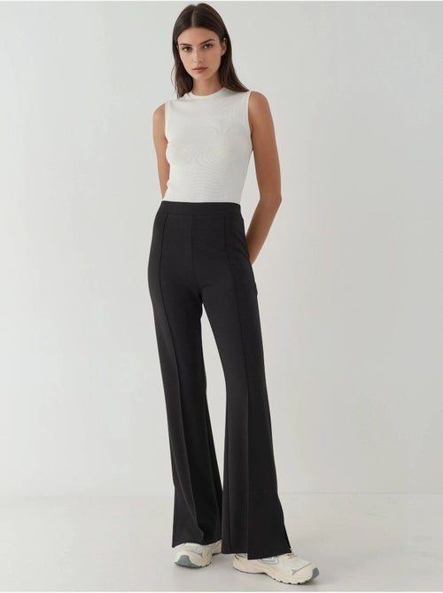 Pantalon évasé taille haute hiccup - Kiabi Pantalon évasé taille haute hiccup - Kiabi